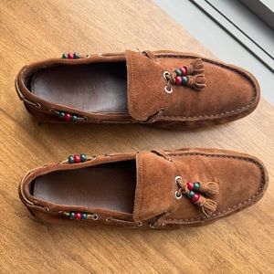 Brown Gucci moccasins